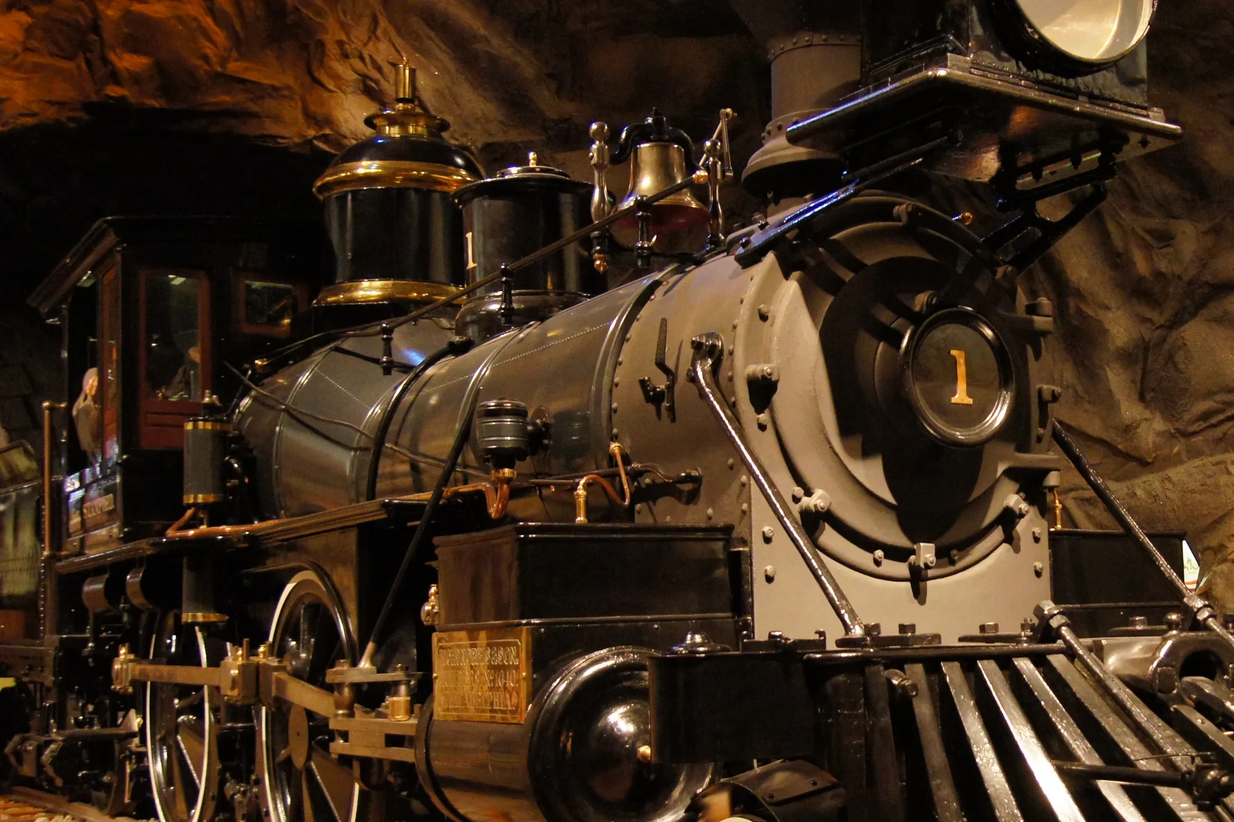 Historic steam locomotive displayed inside the California State Railroad Museum